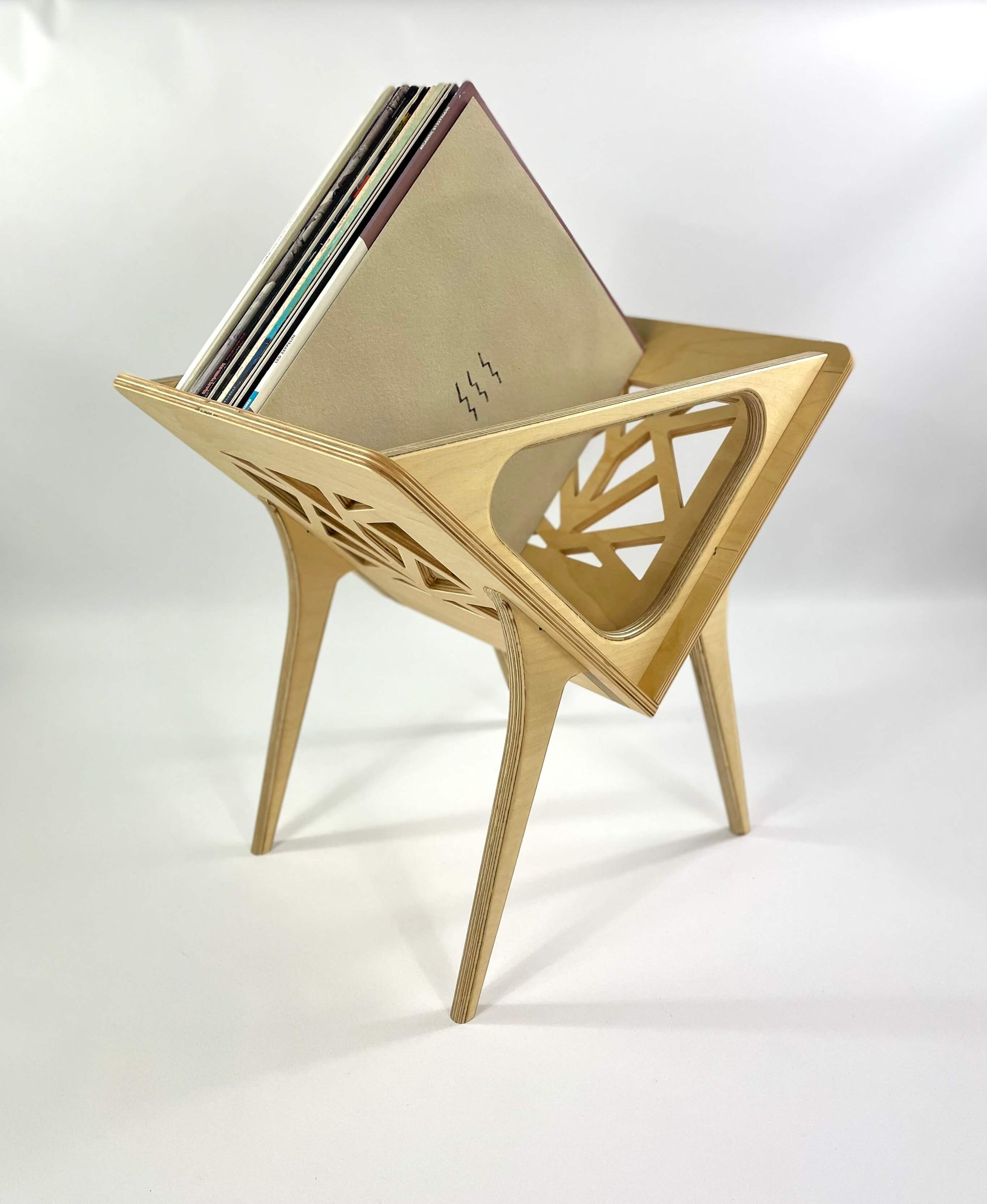 Small Thor vinyl stand in natural beech finish, showcasing open work design