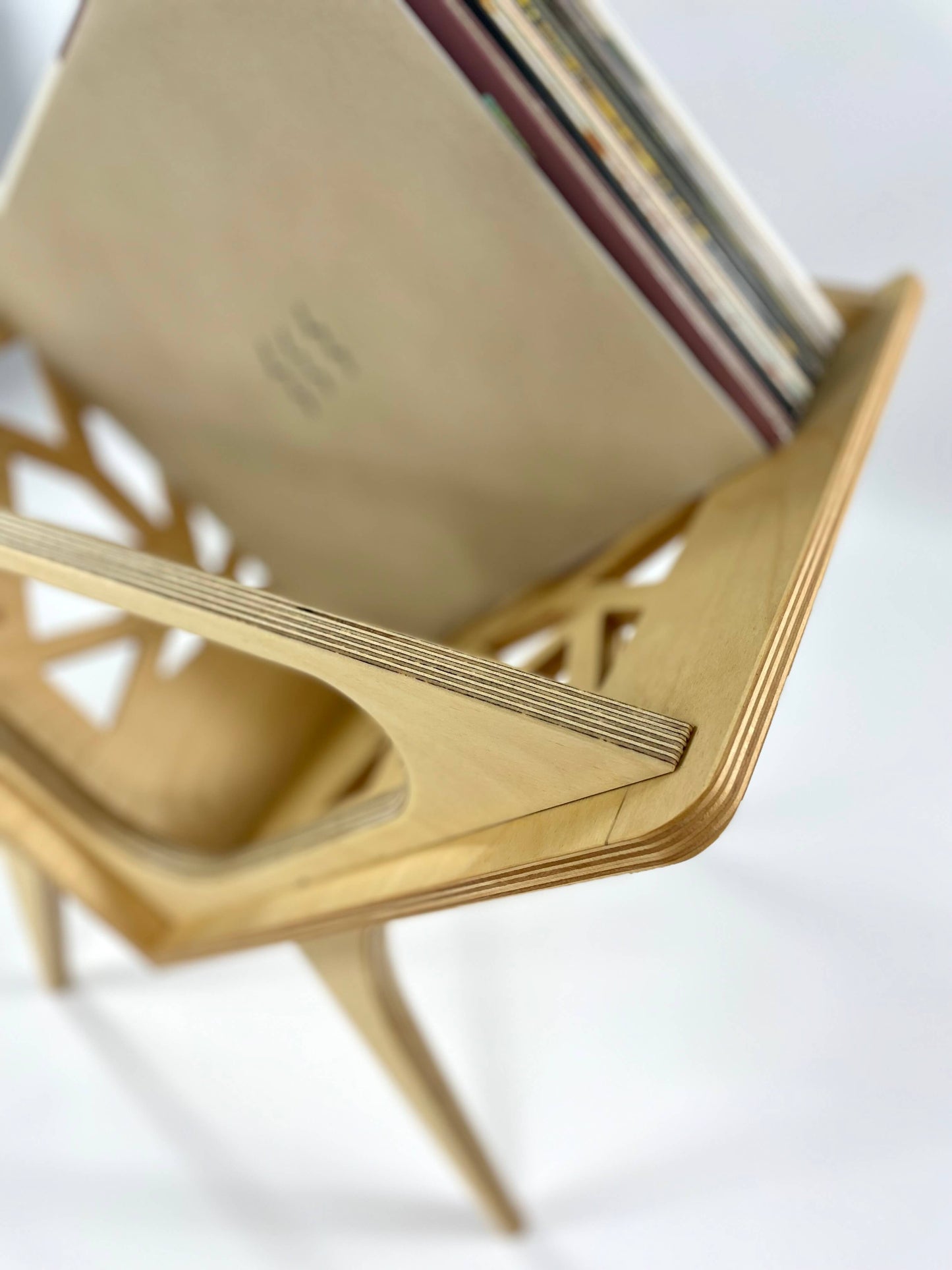 Rear view of Small Thor vinyl stand showing its clean lines and natural wood finish with close look at the wood grain and joinery