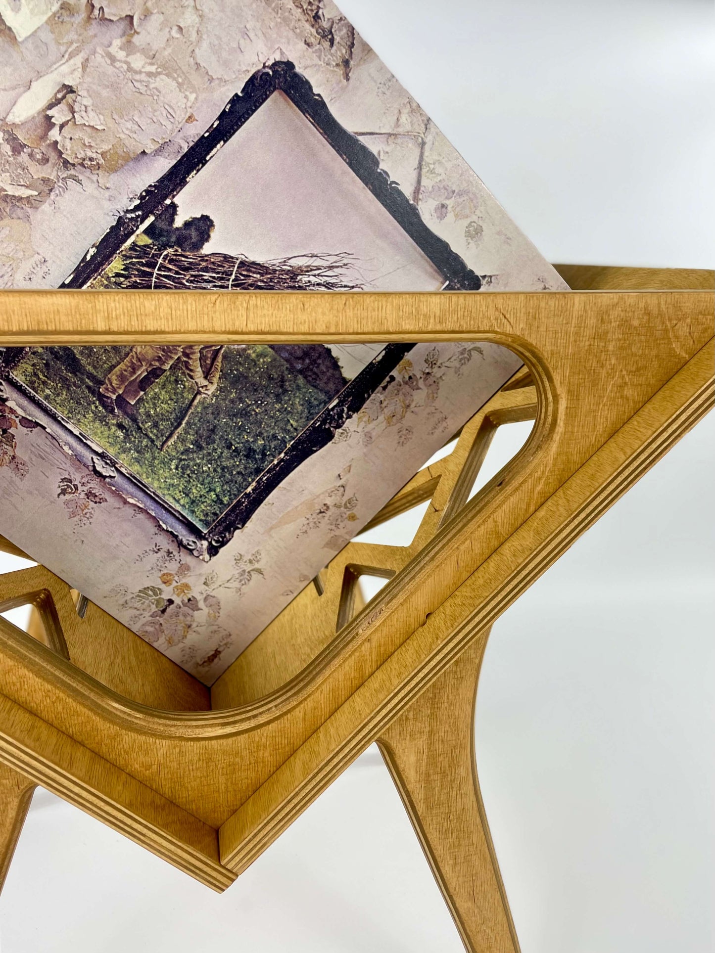 Side view of Small Thor vinyl stand with close-up of interior and wood grain details