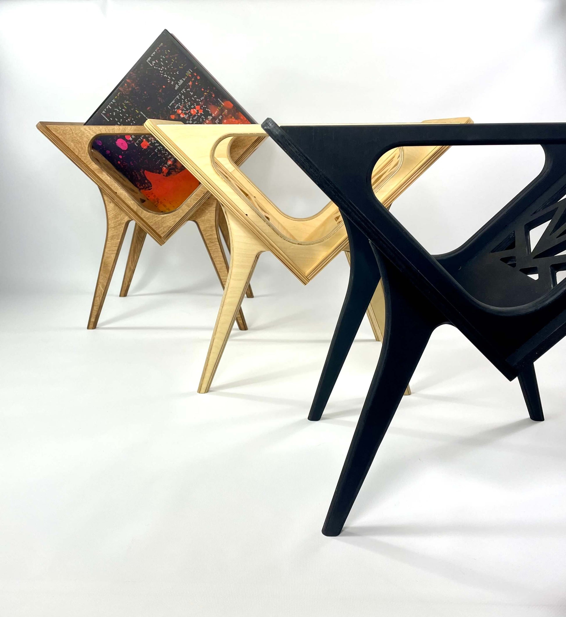 Handcrafted vinyl record stands in multiple wood tones by Ziem Studio