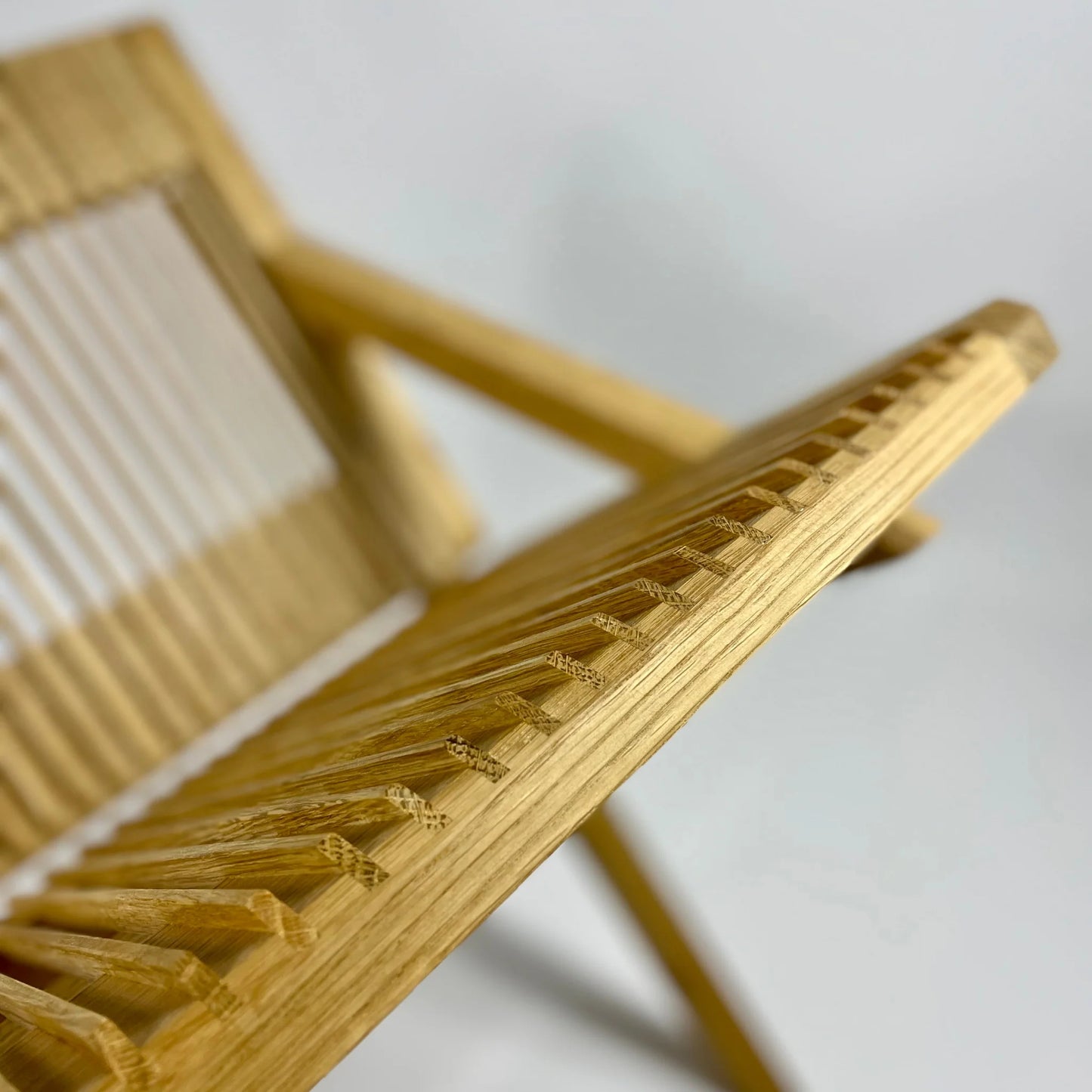 wooden vinyl stand without records on a white background