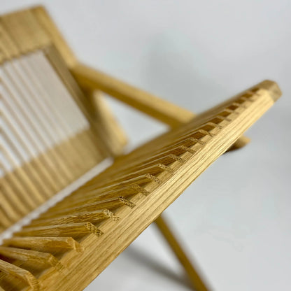 wooden vinyl stand without records on a white background