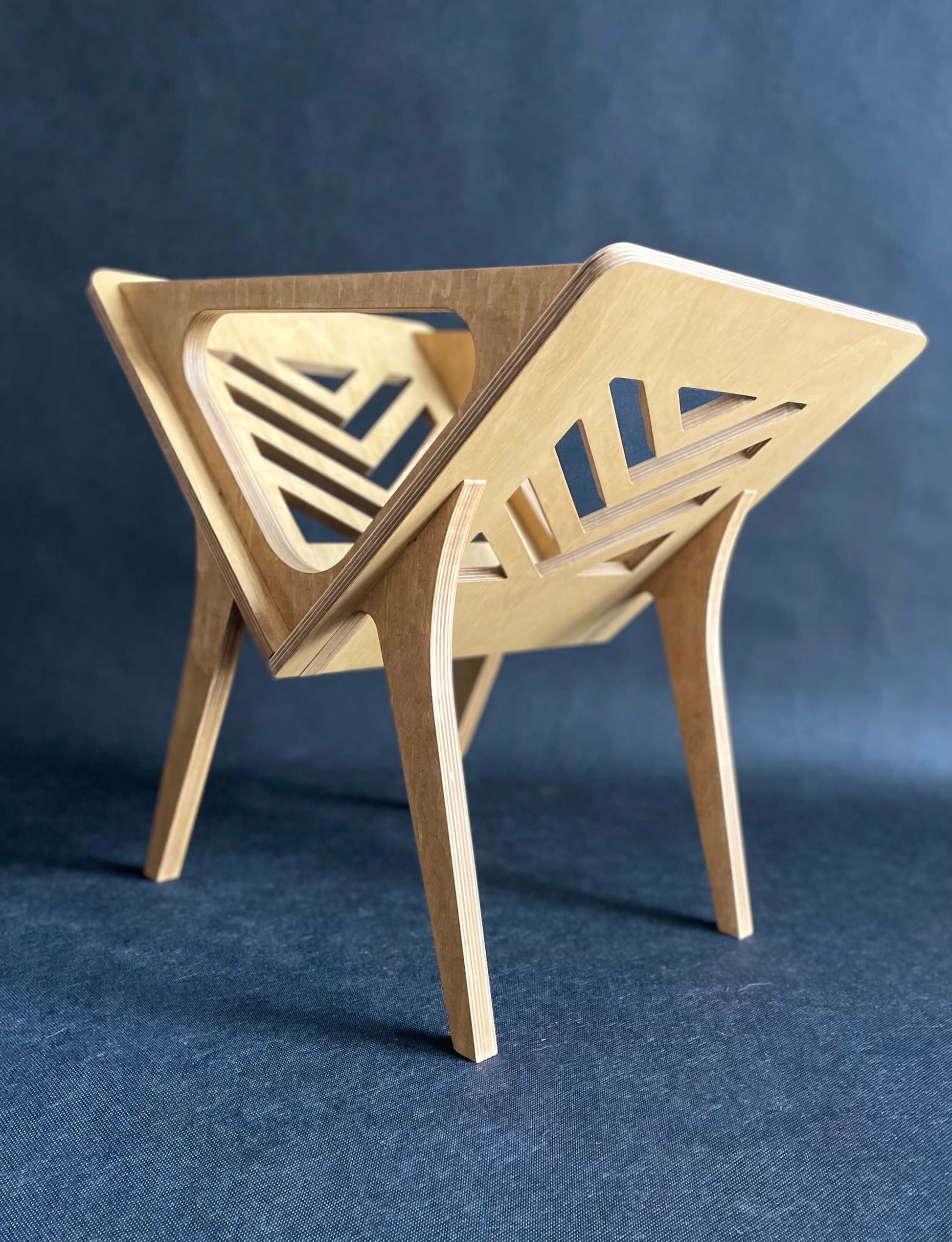 Vinyl stand in natural oil wax finish displaying records in 45 degree rotation