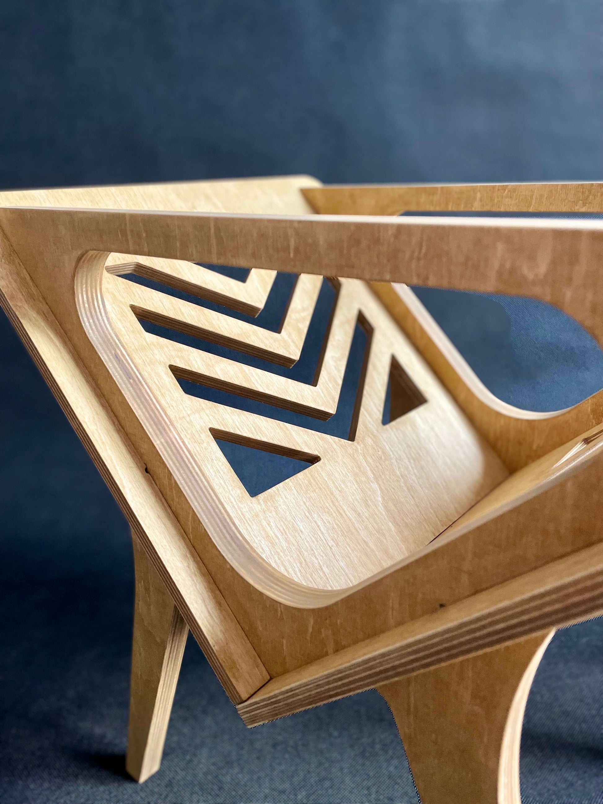 Detail of natural oil-wax finish and wood grain on Thor Herringbone vinyl stand